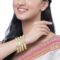 ZENEME Set Of 4 Gold-Plated Classic Paisley Shaped Textured Handcrafted Bangles - Image 2