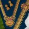 Gold-Plated Bridal Jewelry Set Traditional Temple Lakshmi Design Necklace, Earrings, Maang Tikka & Vaddanam - Image 3