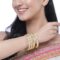 ZENEME Set Of 4 Gold-Plated Classic Paisley Shaped Textured Handcrafted Bangles - Image 4
